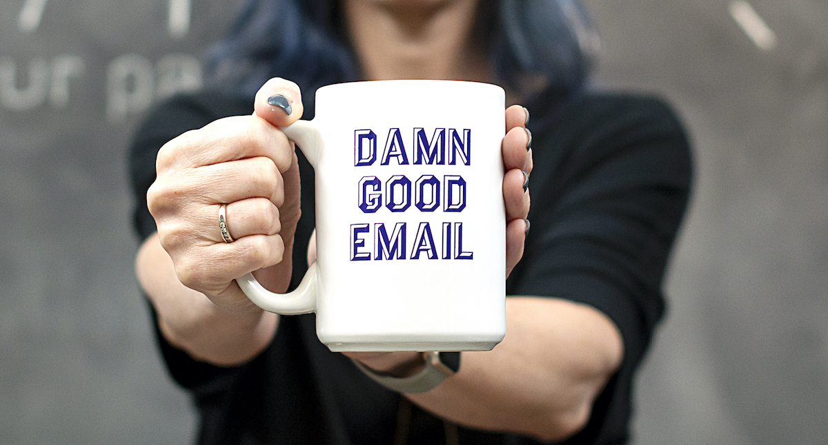 coffee mug with Damn Good Email motto on it